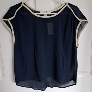 Forever 21, cream and navy blue chiffon blouse.